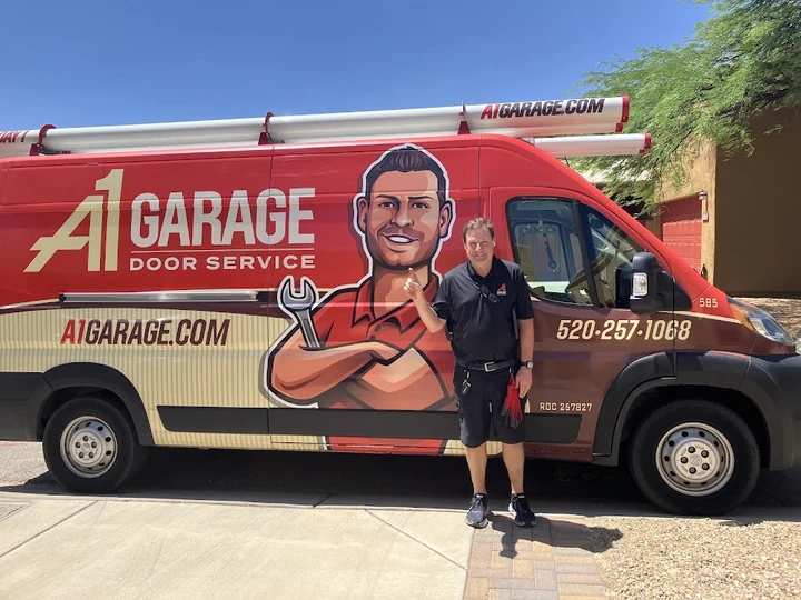 A1 Garage technician posing by their service van.