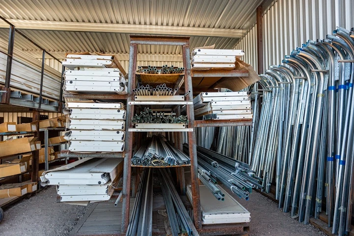 C & D Garage Doors warehouse with organized parts.