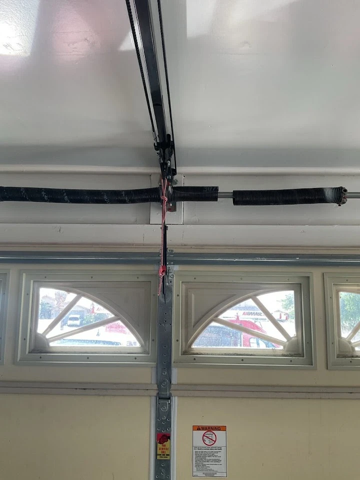 Garage door torsion spring system.