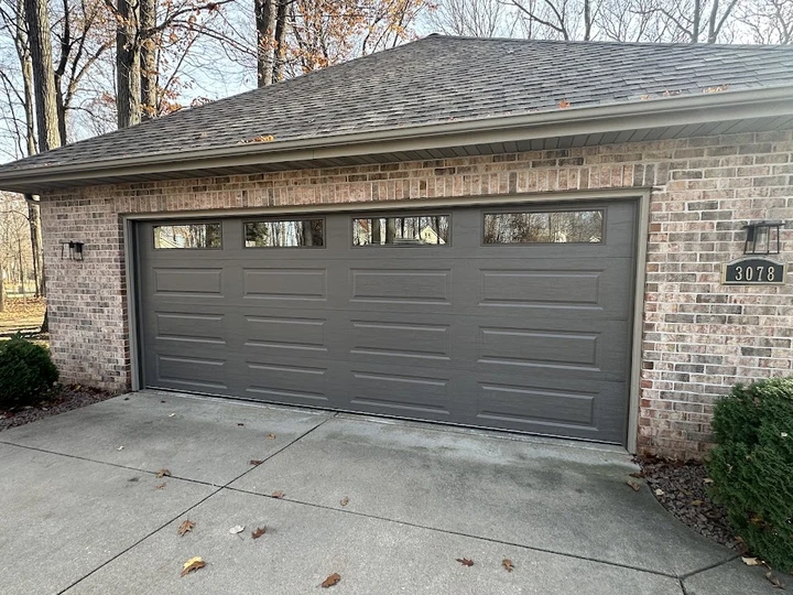 Gray garage door at 3078 by Alpine Garage Doors.