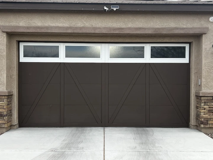 Modern brown carriage-style garage door.