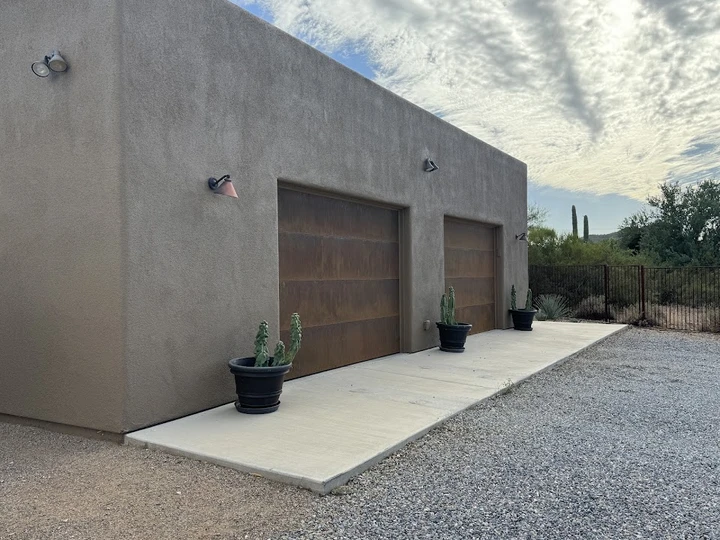 Modern garage doors with rust finish by Overhead Door.