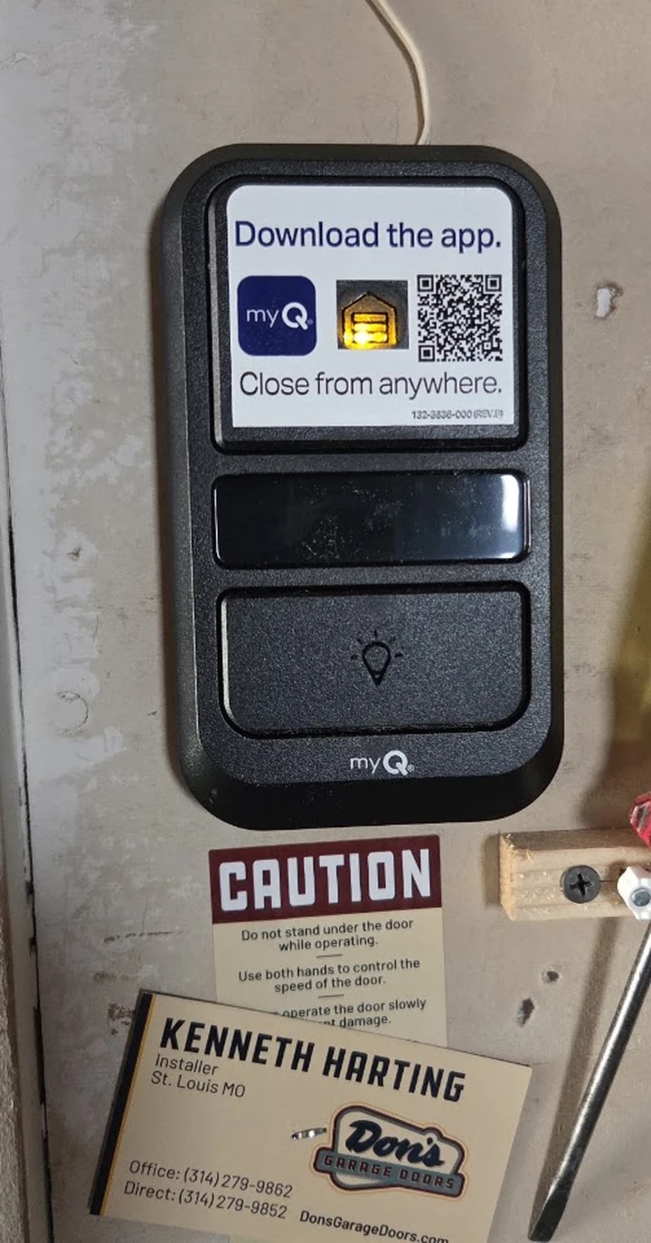 A MyQ garage door opener wall button in St. Louis.