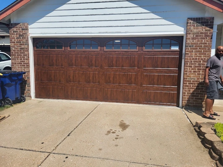 A newly installed brown garage door by RS Garage Door.