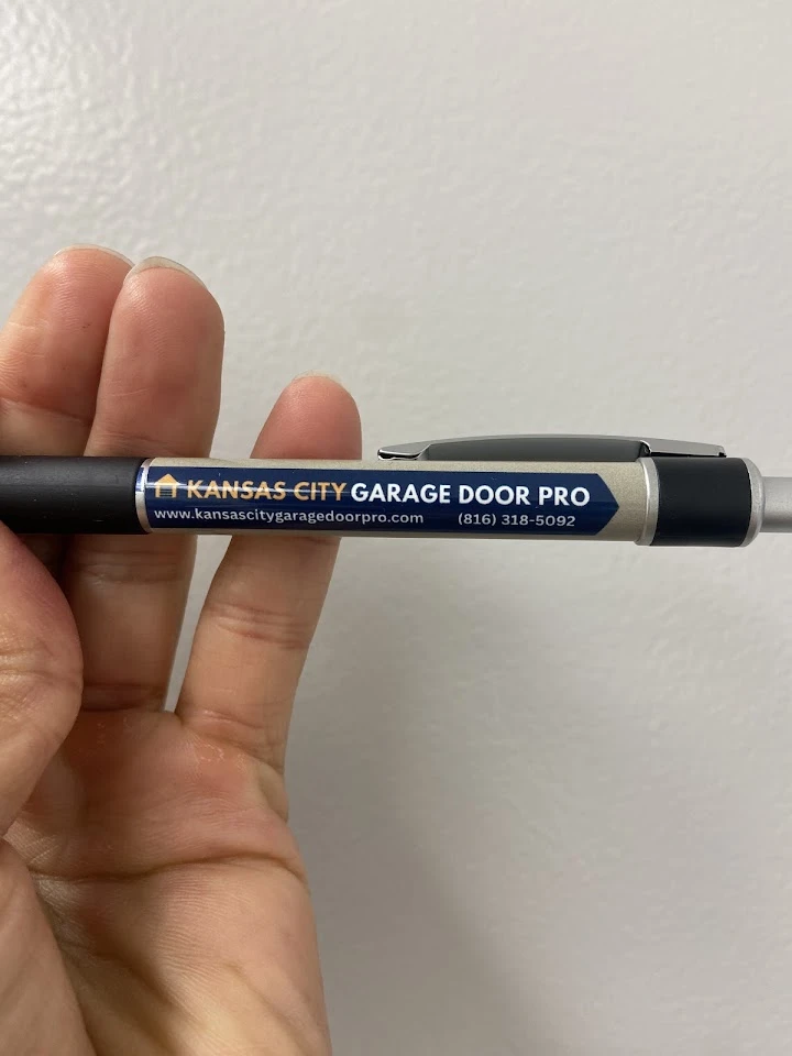 A promotional pen from Kansas City Garage Door Pro.