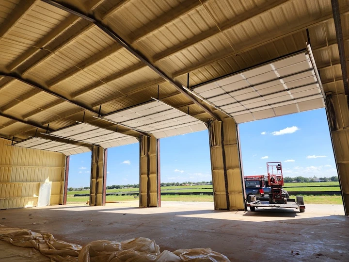 Action Doors: New commercial garage doors installed.