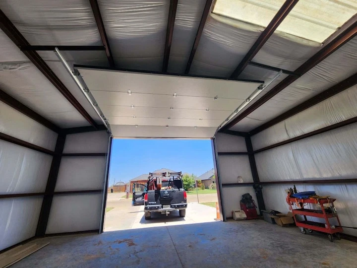 Action Doors overhead garage door installation.