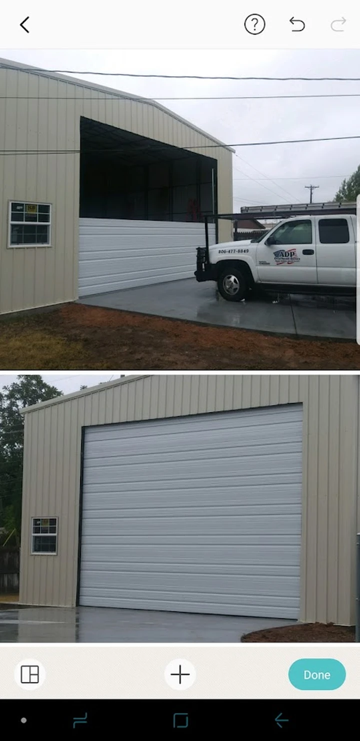 ADP Overhead Door installing a metal building door.