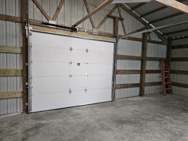 Anytime Garage Doors installation in a modern barn.