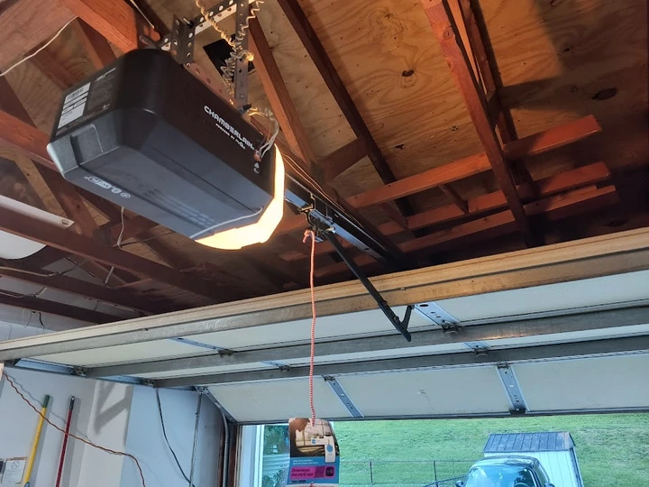 Chamberlain garage door opener on ceiling.