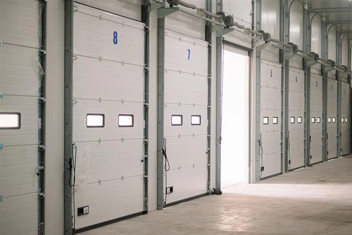 Commercial overhead warehouse bay doors.