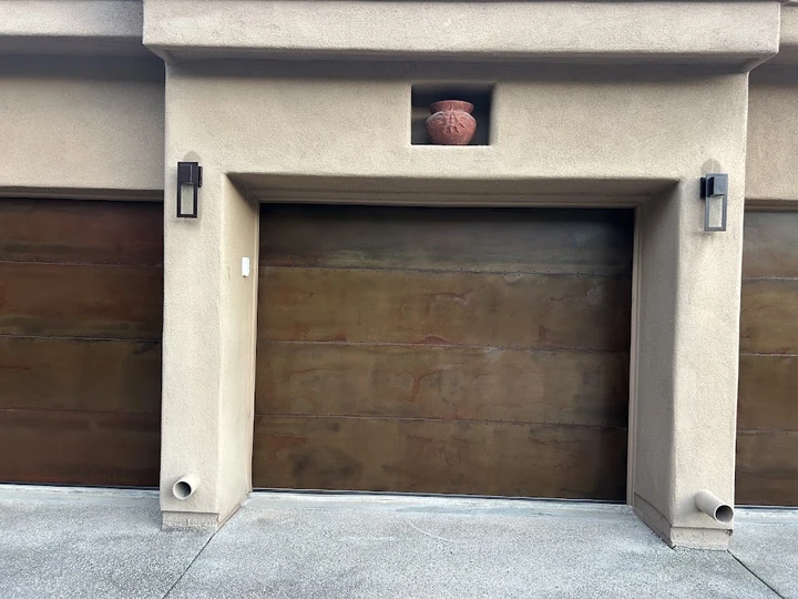Custom rusted metal garage doors.