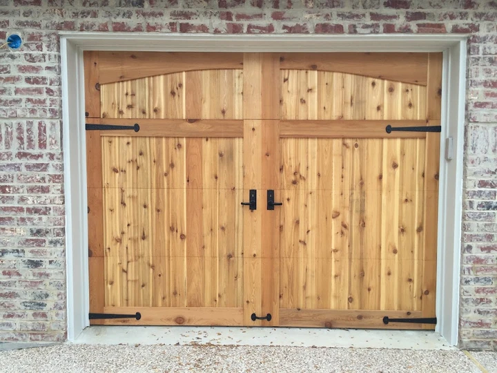 Custom wooden garage doors by Aladdin Overhead Door.