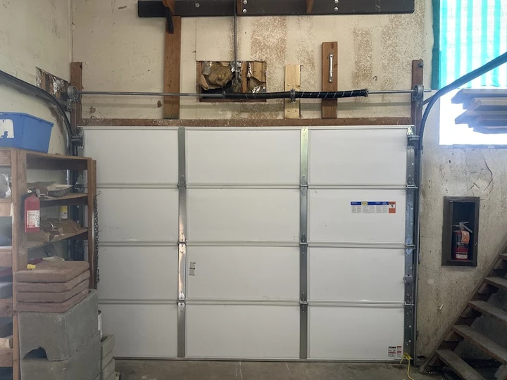 Discount Door Service: New garage door installation.