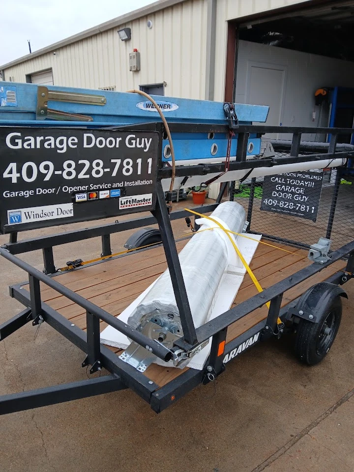 Garage Door Guy trailer with equipment.