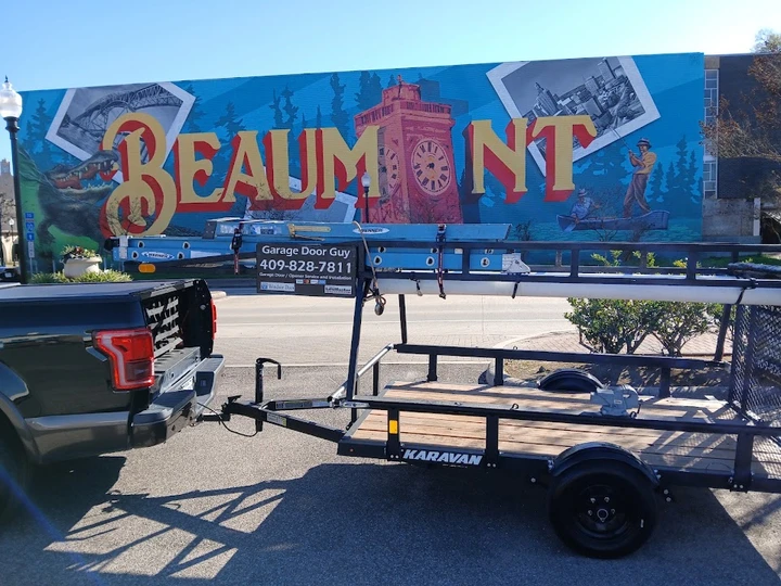 Garage Door Guy truck and utility trailer.