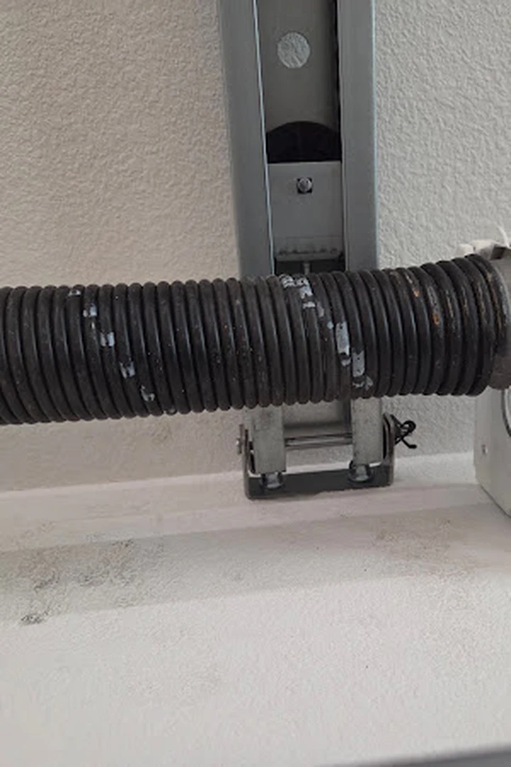 Garage door torsion spring.