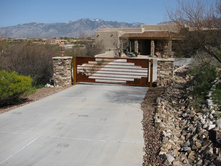 Modern custom metal driveway gate.
