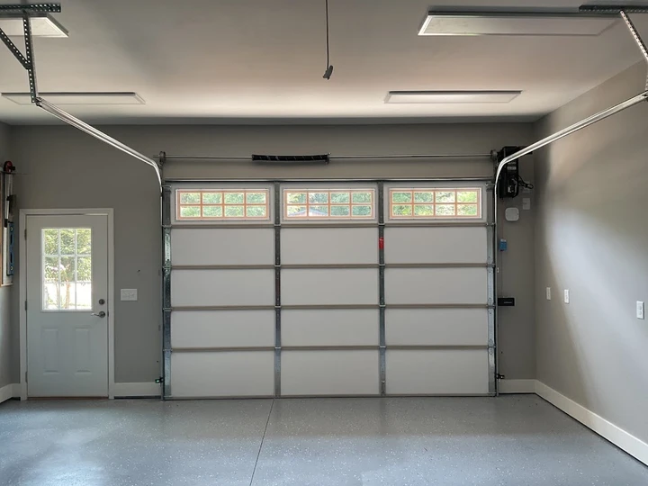 Modern garage interior with a pristine door.