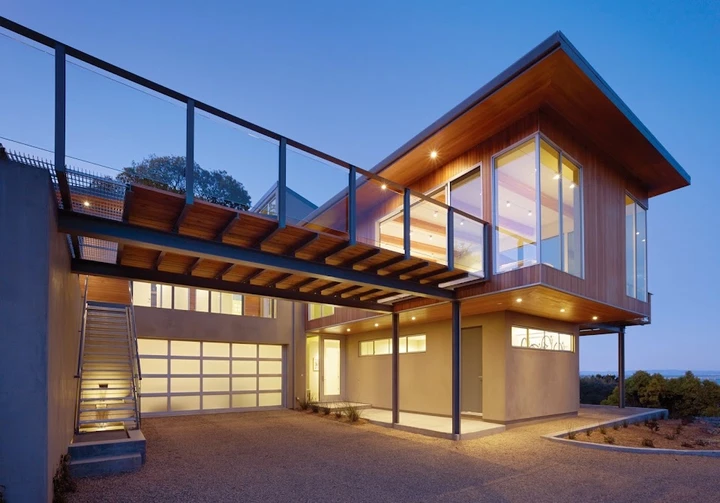 Modern home with an overhead garage door.