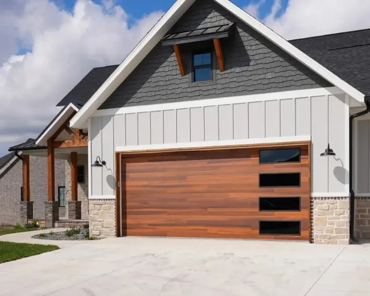 Modern home with wood-look garage door.