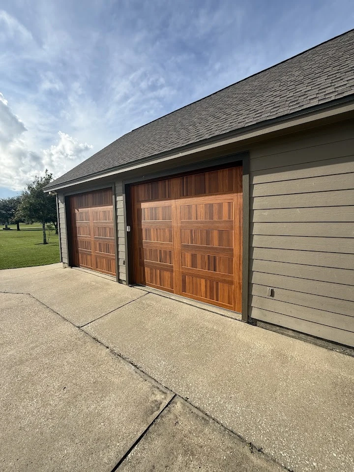 New wooden garage doors installed by Masters Garage.