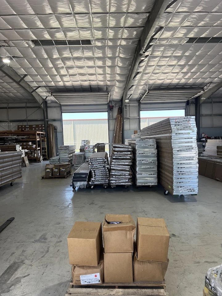 Warehouse storage of inventory for Hub City Overhead Door.