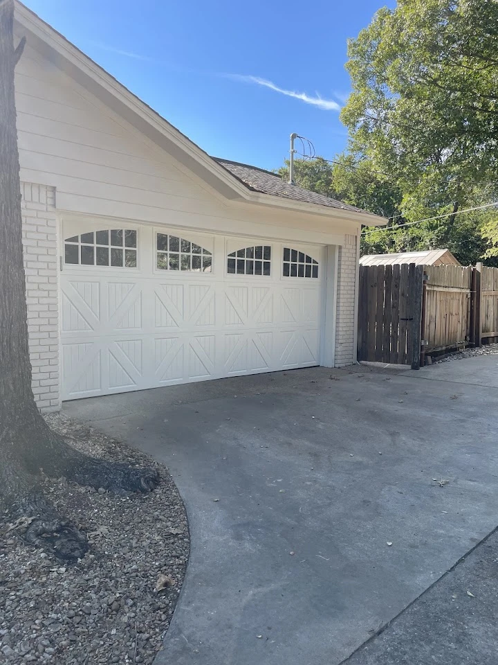White carriage-style garage door.