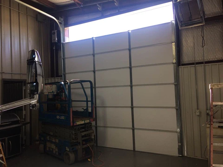White sectional overhead door by ADP.