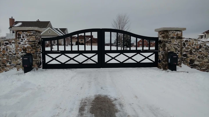 Black metal gate by Fox Valley Overhead Door.