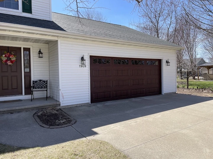 Brown residential garage door by Precision.