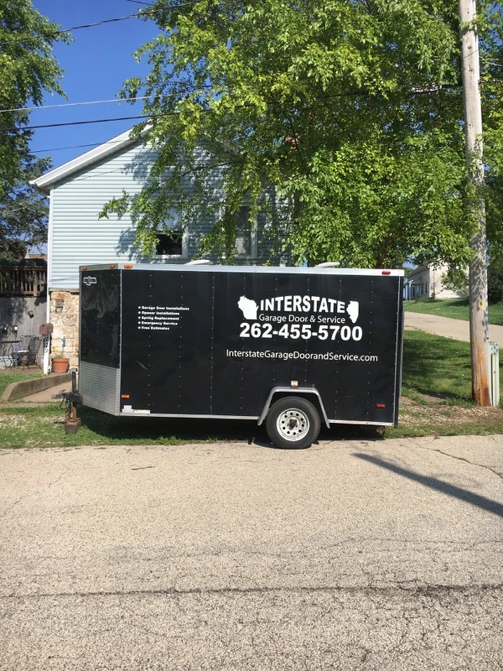 Interstate Garage Door & Service trailer.