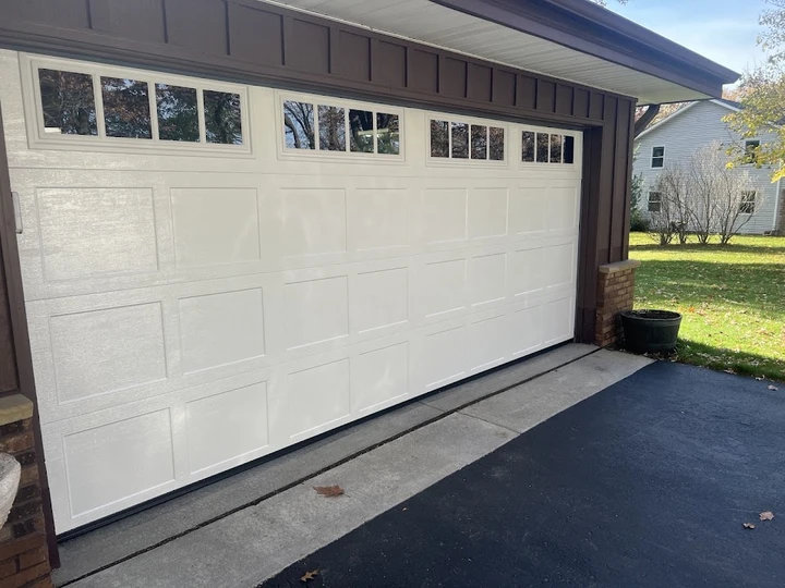 White garage door installed by McDonald Overhead Door.